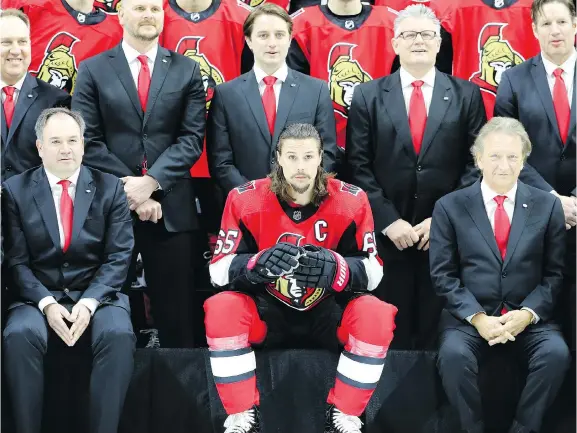  ?? JULIE OLIVER ?? The decision rests with Senators owner Eugene Melnyk, front right, but Postmedia’s survey results indicate the most pressing priority is re-signing captain Erik Karlsson.