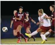  ?? (Photo courtesy SEC/Eric Glemser) ?? Arkansas’ Emilee Hauser takes a shot Thursday during the Razorbacks’ 2-1 victory over South Carolina in the semifinals of the SEC Tournament in Orange Beach, Ala. Hauser scored her first goal of the season in the 53rd minute to give Arkansas a 2-0 lead.