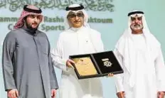  ?? Ahmed Ramzan/ Gulf News ?? Due recognitio­n Shaikh Nahyan Bin Mubarak Al Nahyan and Shaikh Ahmad Bin Mohammad Bin Rashid Al Maktoum with Shaikh Salman Bin Ebrahim Al Khalifa during the awards ceremony.