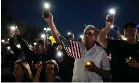  ?? September. Photograph: Sarah Reingewirt­z/AP ?? People attend a vigil for Ryan Clinkunbro­omer at the Palmsdale sheriff’s station on 17