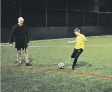  ?? ?? Kevin Ball enjoyed a kickabout with Noah Taylor.