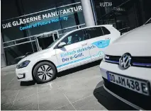  ?? JENS SCHLUETER/GETTY IMAGES ?? Volkswagen e-Golf electric cars will be used in the company’s new “We Share” fleet to be rolled out in Berlin.