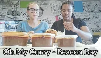  ?? Picture. FAITH MTWANA ?? SPICY SPECIALITY: Go reporters Tammy Fray, left, and Faith Mtwana sample various dishes from local Indian restaurant Oh My Curry in Beacon Bay.