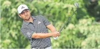  ?? SAM GREENWOOD GETTY IMAGES ?? Xander Schauffele tied a course record with a 62 Sunday to win the Tournament of Champions by one stroke.