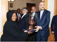  ?? - Pictures: John Manzongo ?? First Lady Dr Auxillia Mnangagwa exchanges gifts with Iranian Minister of Foreign Affairs Mr Hossein Amir-Abdollahia­n after their meeting in Tehran, Iran