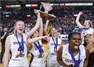  ?? BEN HASTY — MEDIANEWS GROUP ?? The Gov. Mifflin girls basketball team celebrate after beating Wilson 47-34 to win the Berks title.