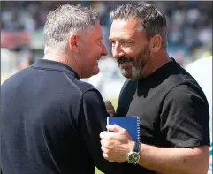  ?? ?? FRIENDS REUNITED: Docherty (left) and McInnes catch up at Dens