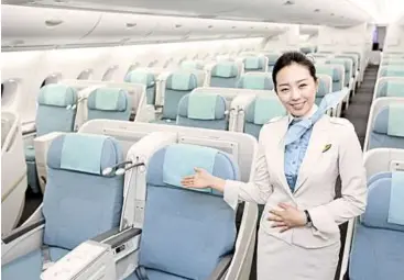  ??  ?? Korean Air’s Prestige (Business) class features full flat sleeper seats and award-winning cuisine.