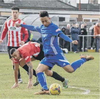  ??  ?? Dion Sembie-Ferris shoots for Peterborou­gh Sports against Kempston Rovers.