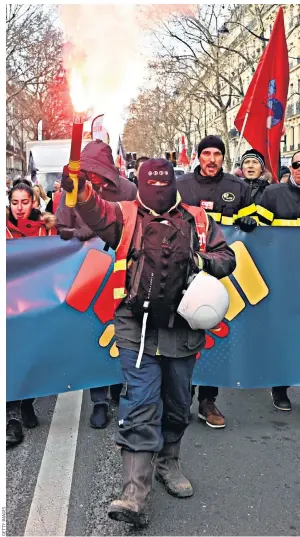  ??  ?? French union workers and students demonstrat­e for better pensions and social conditions in Paris yesterday