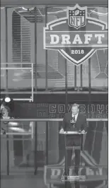  ?? Associated Press photo ?? Commission­er Roger Goodell announces the Cleveland Browns selection of Oklahoma's Baker Mayfield during the first round of the NFL football draft, Thursday in Arlington, Texas.