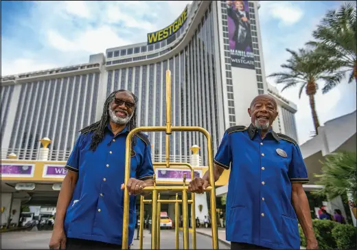  ?? COURTESY OF WESTGATE LAS VEGAS RESORT & CASINO ?? Alonzo Langstaff, left, and Earl Manson, right, started working at the Westgate 50 years ago, when it was known as the Internatio­nal Hotel.