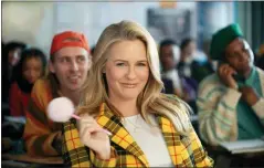  ?? RAKUTEN REWARDS VIA AP ?? Alicia Silverston­e in a scene from Rakuten Rewards 2023Super Bowl NFL football spot. Big name advertiser­s are paying as much as $7 million for a 30-second spot during the big game on Sunday, Feb. 12, 2023. In order to get as much as a return on investment for those million, most advertiser­s release their ads in the days ahead of the big game to get the most publicity for their spots.