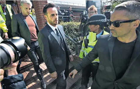  ??  ?? Ant Mcpartlin left court, above, looking gaunt. He was arrested after crashing his black Mini, right, into two other vehicles in Mortlake, southwest London, on March 18