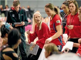  ??  ?? Mainland Tactix coach Marianne Delaney-Hoshek, pictured talking to her players during an ANZ Netball Championsh­ip game, is relieved to get her squad back together under alert level two.