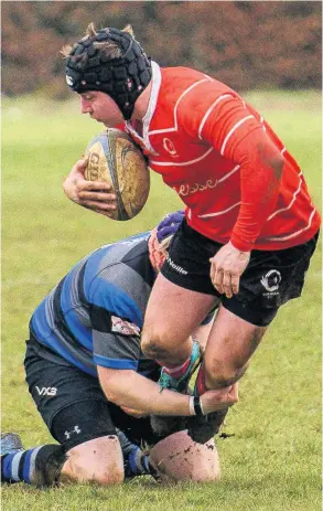  ??  ?? Frome go low to make a tackle on Corsham 2nds