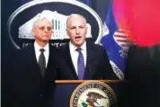  ?? AP PHOTO/CAROLYN KASTER ?? Justice Department’s Assistant Attorney General for the National Security Division Matthew Olsen, right, speaks during a Jan. 27 Department of Justice news conference in Washington, as Attorney General Merrick Garland listens.