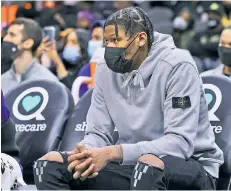  ?? Getty Images ?? TRADING PLACES: Cam Reddish, out with an ankle injury, watches the Knicks’ game Saturday from the bench.