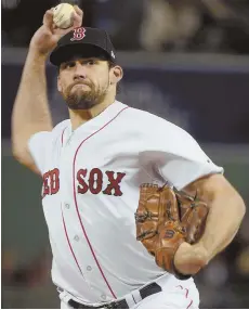  ?? HERALD PHOTOS BY JIM MICHAUD ?? ROUT IS ON: Nathan Eovaldi (above) delivers a pitch, and Mookie Betts (right) smiles after hitting a home run during the Sox' 6-2 win against the Orioles last night.