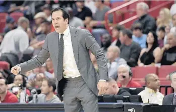  ?? MICHAEL LAUGHLIN/STAFF FILE PHOTO ?? Erik Spoelstra: “We are in meaningful games and the fact that there are 18 left, man, we have a lot to be grateful for.”