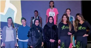  ?? Supplied photo ?? Winners of the Sharjah Ladies Run with organisers at Sharjah University City. Of 1,500 runners who participat­ed in the event, 66 per cent was Emiratis. —