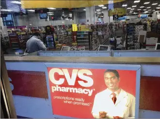  ?? CORNELIUS FROLIK / STAFF ?? Dayton water customers can pay their bills at CVS Pharmacy, including this store downtown, and Family Dollar stores. Officials say it could save time and transporta­tion costs for customers.