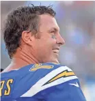  ?? JAKE ROTH/USA TODAY SPORTS ?? Chargers quarterbac­k Philip Rivers smiles during a game earlier this season.