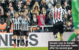  ??  ?? Kenedy runs to Dwight Gayle and DeAndre Yedlin after his second goal