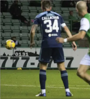  ??  ?? Hibernian striker Kevin Nisbet scores the first of his two goals as the Easter Road side held on to beat Hamilton