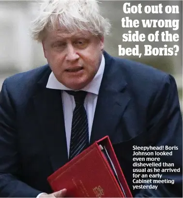  ??  ?? Sleepyhead! Boris Johnson looked even more dishevelle­d than usual as he arrived for an early Cabinet meeting yesterday