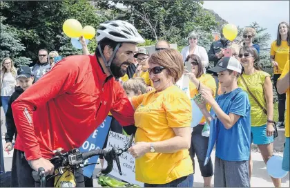  ?? JOE GIBBONS/THE TELEGRAM ?? Matthew Pike is greeted by Mabel Hancock, Craig Pike’s mother, upon the completion of his cross-canada trek in memory of Craig, who would have turned 37 on Tuesday.