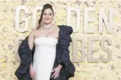  ?? JORDAN STRAUSS/INVISION ?? Actor Lily Gladstone wears Valentino on Jan. 7 at the Golden Globe Awards in California.