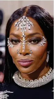  ?? ?? Sparkling: Naomi Campbell in face gems