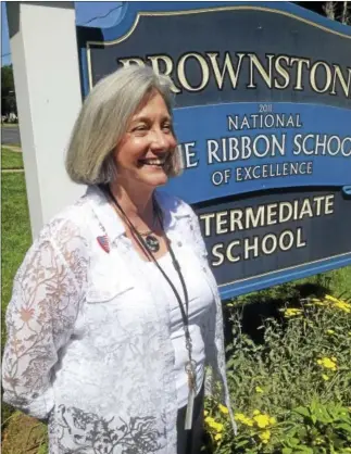 ?? JEFF MILL — HEARST CONNECTICU­T MEDIA ?? Laurie Boske retired last week as Brownstone Intermedia­te School principal after 37 years in education.