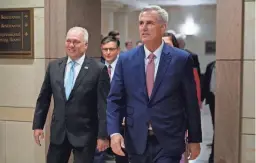  ?? PATRICK SEMANSKY/AP ?? Reps. Kevin McCarthy, right, and Steve Scalise, R-La., are seen Tuesday in Washington. Republican lawmakers and their staff for the past year have been analyzing messages and financial transactio­ns found on a laptop that belonged to Hunter Biden.