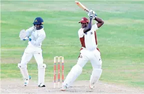  ?? CWI MEDIA PHOTO ?? Nkrumah Bonner cuts a ball on the first day of the second-round match between Barbados Pride and Leeward islands Hurricanes on Wednesday, November 1, at Kensington Oval.