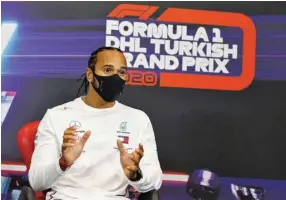  ??  ?? Lewis Hamilton speaks during the Turkish Grand Prix at Istanbul Park circuit last November.