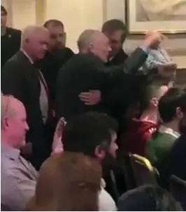  ??  ?? Row: Mr Corbyn is heckled by an indy campaigner in Dundee