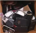 ??  ?? A collection of electronic­s to be recycled by Goodwill Industries of Arkansas.