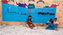  ?? MARKO DROBNJAKOV­IC/ASSOCIATED PRESS ?? Children play at a camp for displaced families in Dibaga, near Mosul, Iraq, on Monday. The campaign to retake Mosul from IS is expected to take weeks, and the city remains home to 1 million people.