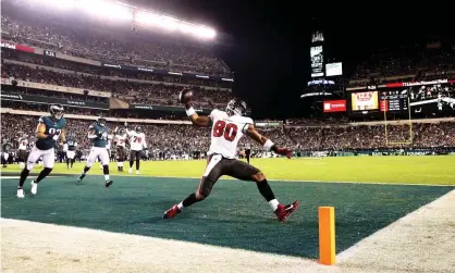  ?? Photograph: Tim Nwachukwu/Getty Images ?? Tight end OJ Howard of the Tampa Bay Buccaneers spikes the ball after catching a first quarter touchdown pass against the Philadelph­ia Eagles at Lincoln Financial Field on Thursday night.