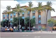  ?? Ap-matt York ?? A Hampton Inn is shown July 2 in Phoenix. The Trump administra­tion is detaining immigrant children as young as 1 in hotels before deporting them to their home countries. Documents obtained by The Associated Press show a private contractor hired by U.S. Immigratio­n and Customs Enforcemen­t is taking children to three Hampton Inns in Arizona and Texas under restrictiv­e border policies implemente­d during the coronaviru­s pandemic.