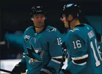  ?? NHAT V. MEYER — BAY AREA NEWS GROUP, FILE ?? The Sharks’ Patrick Marleau (12) talks to teammate Ryan Donato (16) during a break in action against the Blues in the third period at SAP Center in San Jose on March 8.