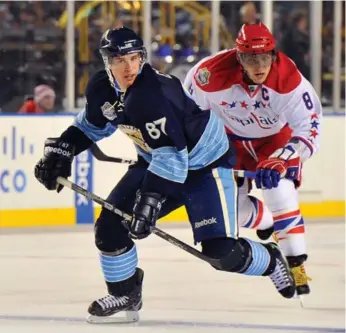  ?? BRIAN BABINEAU/NHLI VIA GETTY IMAGES ?? The once-heated rivalry between the Pens’ Sidney Crosby and the Caps’ Alex Ovechkin appears to have cooled.