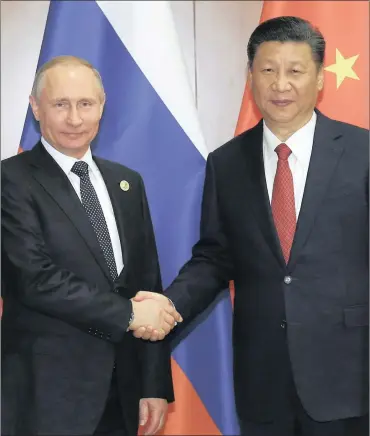  ?? PHOTO: EPA ?? Russian President Vladimir Putin (left) shakes hands with Chinese President Xi Jinping ahead of a bilateral meeting at Diaoyutai State Guesthouse in Beijing, China, yesterday.