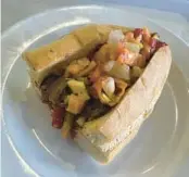  ?? ITALIAN DELI & MARKET STASIO’S ?? Italian beef is a one-day-only special at Stasio’s. Get in there today for a taste of their kicked-up giardinier­a.