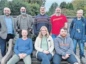  ?? ?? Innovative project Paul Laidlaw, standing far left, from the Scottish Flood Forum, with RAFT members Jock Manson, Grant Train and Stewart McNiven. Seated, from left, are other RAFT members Erwin Oosterhorn, Alex Warrington and Callum Brooks. Also pictured, far right, is Robert Walsh, a senior project officer for The Conservati­on Volunteers. Pic: Clare Damodaran