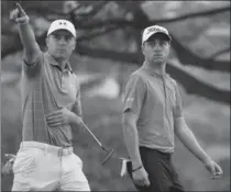  ?? GETTY IMAGES FILE PHOTO ?? Buddies, with contrastin­g personalit­ies: Americans Jordan Spieth, left, and Justin Thomas.