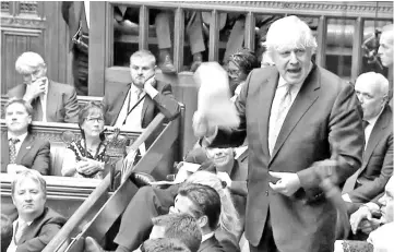  ?? — AFP photo ?? A video grab from footage broadcast by the UK Parliament’s Parliament­ary Recording Unit (PRU) shows Johnson as he speaks in the House of Commons in London.