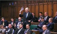  ?? AP ?? Lawmaker Boris Johnson stands to speak Tuesday in the House of Commons at the start of a five-day debate on Great Britain’s exit from the European Union.